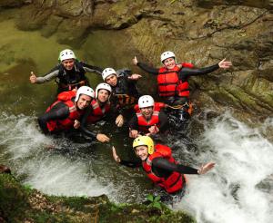 A group of people canyoning
